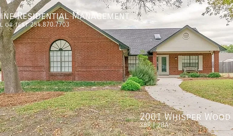 2001 Whisper Wood Rd — Photo 1