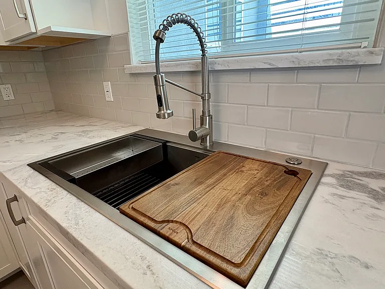 SS sink with removable strainer and cutting board