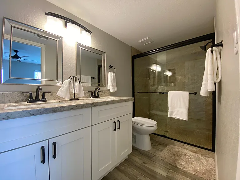 Master Bath with dual vanities and step in shower