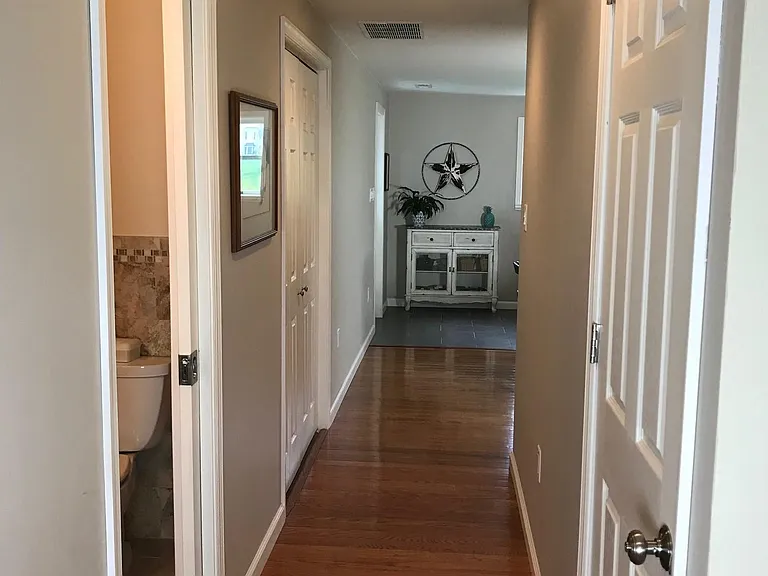 Side hall way to, 2nd bath rm, laundry and kithcen kitchen