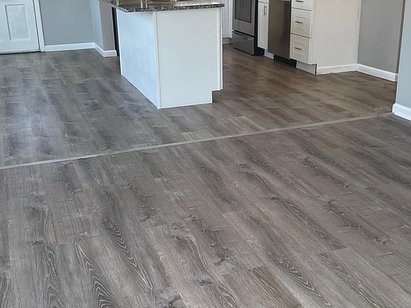 Living room looking into kitchen