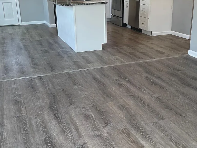 Living room looking into kitchen
