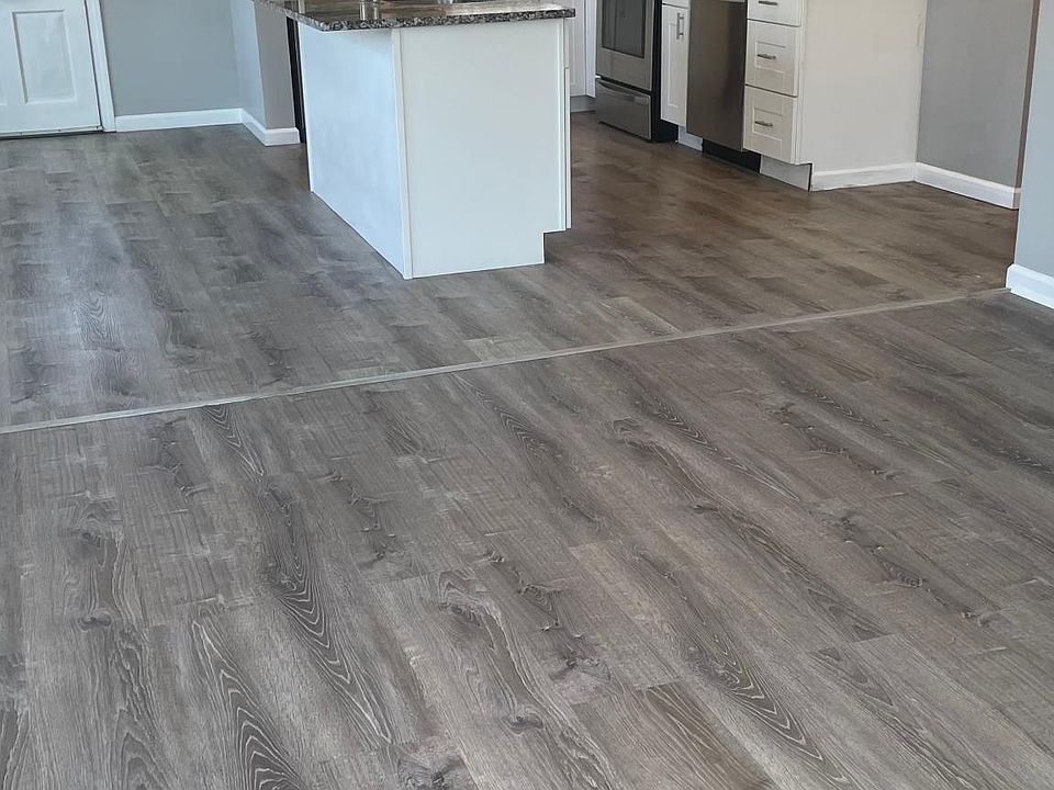 Living room looking into kitchen