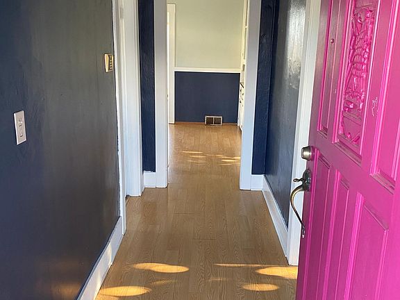 Entry - bathroom on left, kitchen straight ahead, living room on right