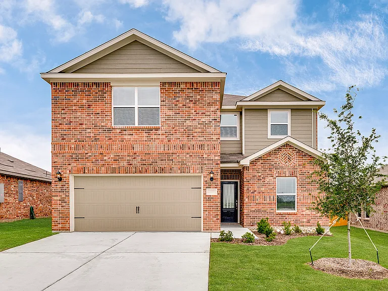 The Cottonwood is a beautiful brick two-story home.