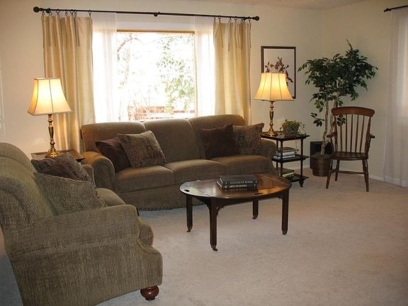 Living Room w/ Picture Window looking into backyard