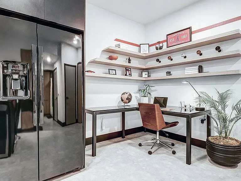 Griffis Platinum Triangle desk area with built in shelves.