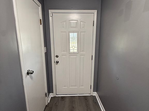 Front door and the coat closet.