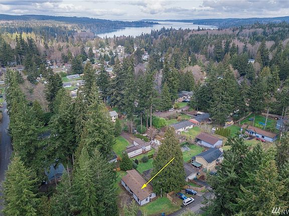 The Yellow arrow in the photo is showing the home for sale and its location relative to the rest of Gamblewood.