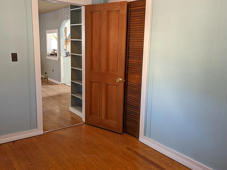 smaller bedroom/front bedroom looking outward