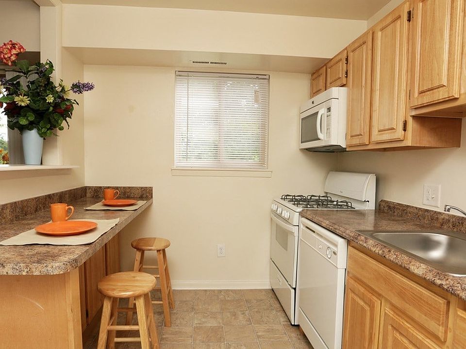 Spacious kitchen with pantry storage and breakfast bar
