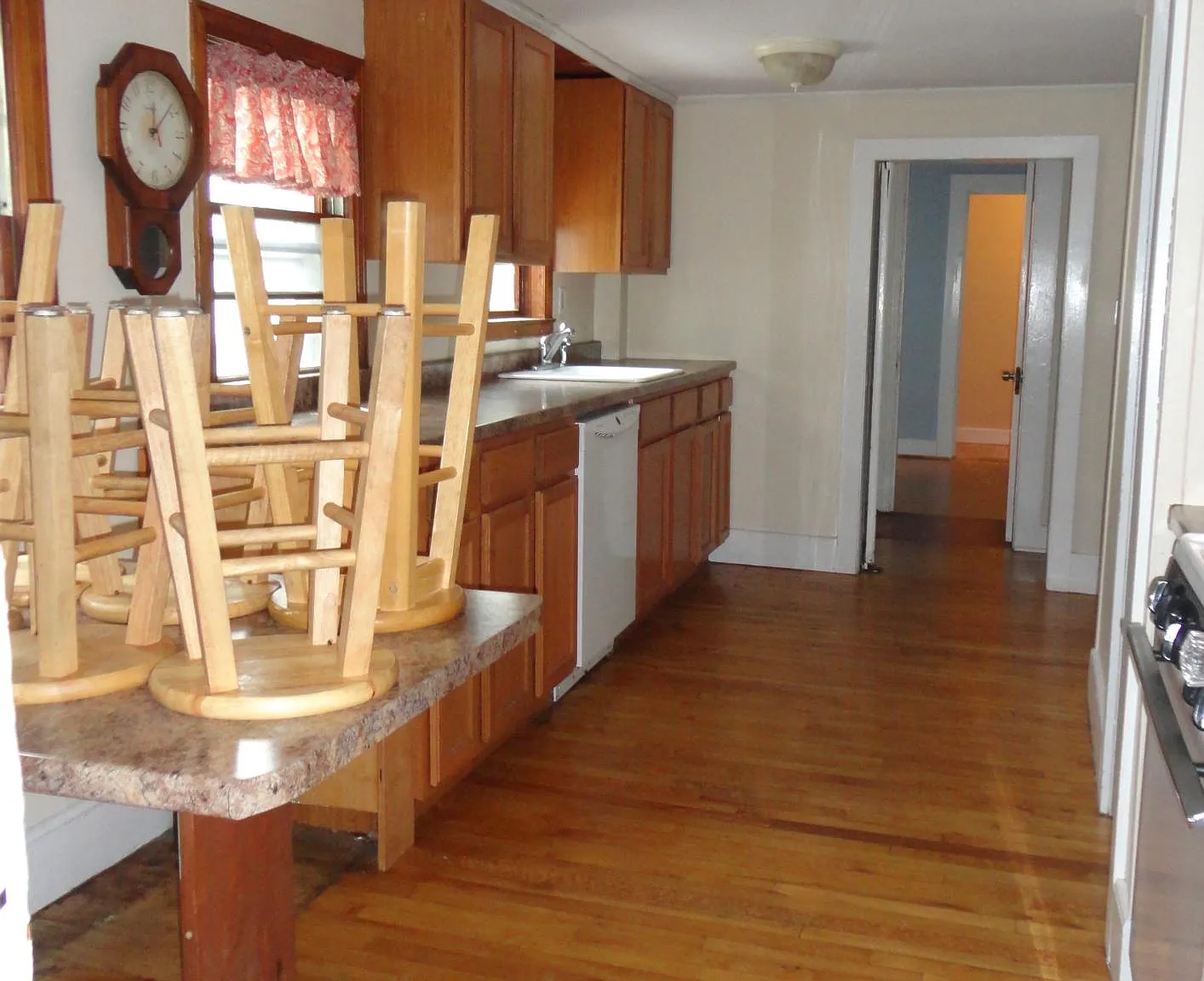 Kitchen from porch towards bath, Bedroom #2 & front hall