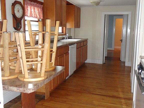 Kitchen from porch towards bath, Bedroom #2 & front hall