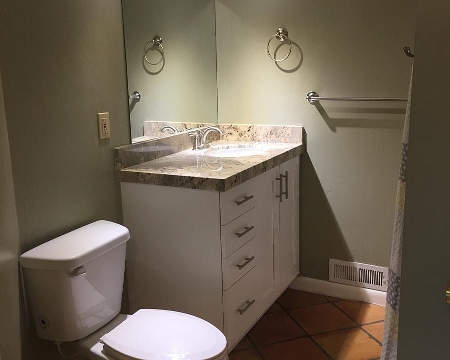Bath with shower/tub