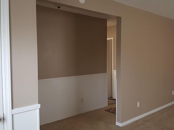 living area  from foyer to hallway, kitchen and bedrooms