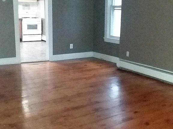 Large living room, sun-filled, closet space