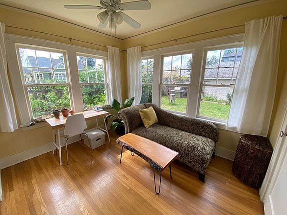 Sunroom staged for office/sitting room, and large closet w/built in hest of drawers