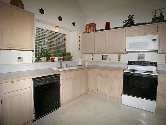 Eat-in Kitchen Walks Out to Fenced Backyard