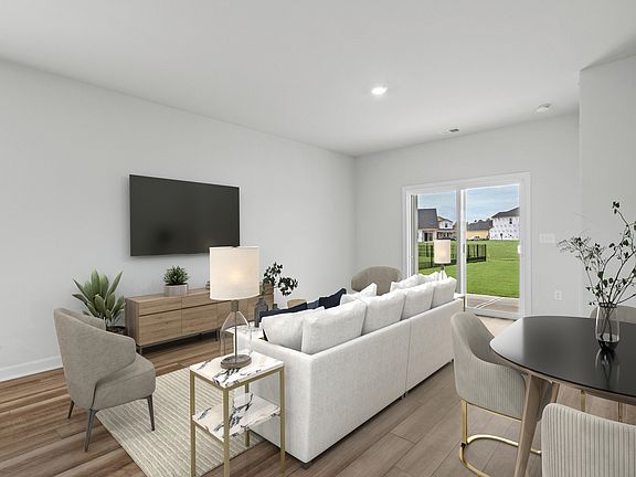 Enjoy movie nights or the big game in this cozy great room