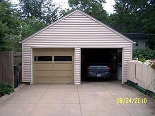 2 car garage with additional space in the back