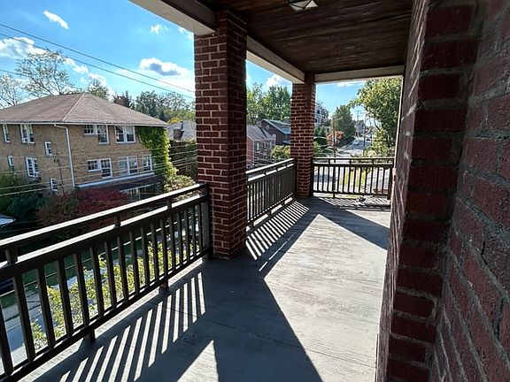Front porch, 3rd floor. View down School Street.