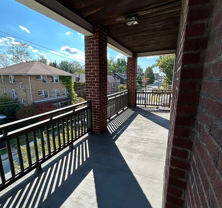 Front porch, 3rd floor. View down School Street.
