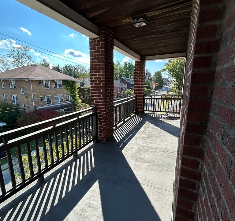 Front porch, 3rd floor. View down School Street.
