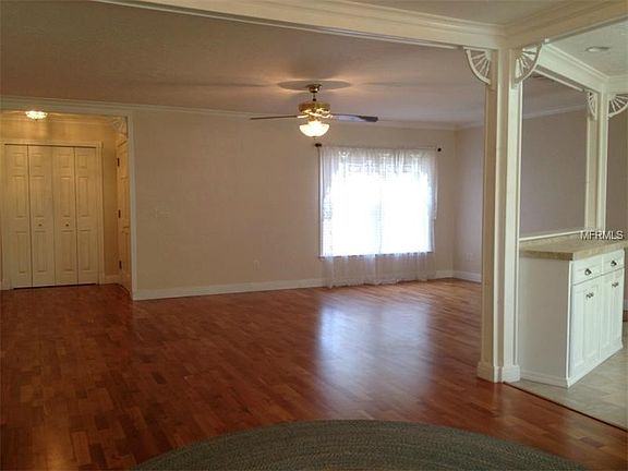 Living, Dining Area - note storage closet in foyer