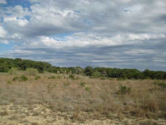 Backs up to private ranch for much privacy