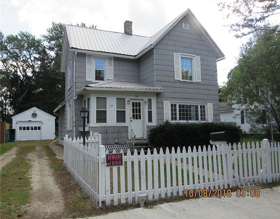Welcome to 755 Madison St. This quaint house offers a nice big yard and a brand new metal roof!