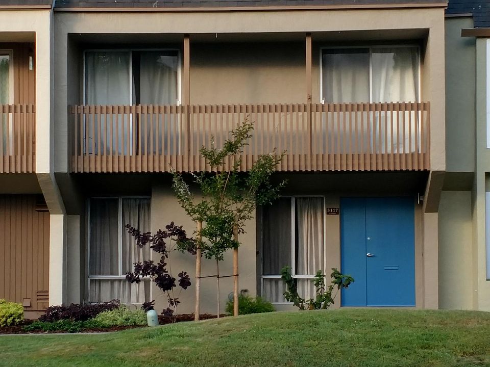 The house opens onto a beautiful courtyard with new landscaping.