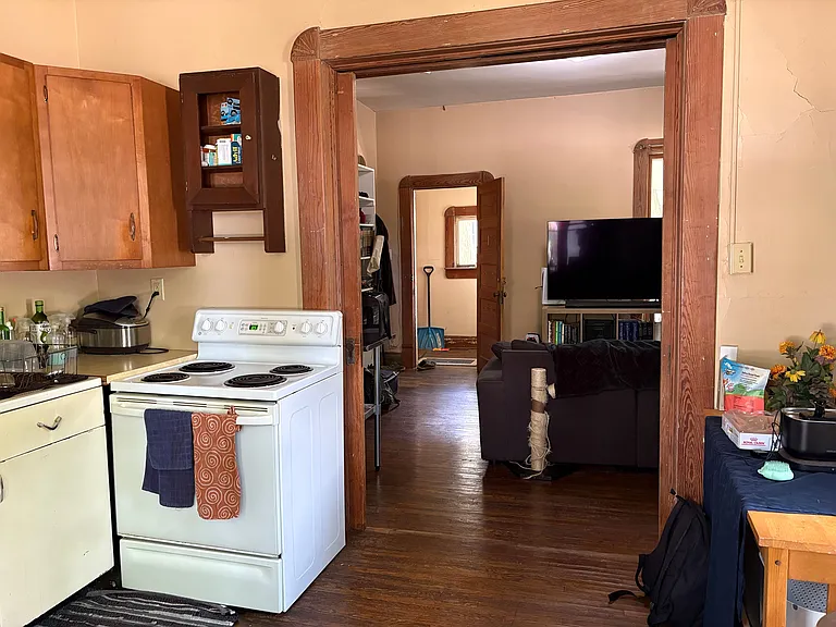 Kitchen towards living rm and entry