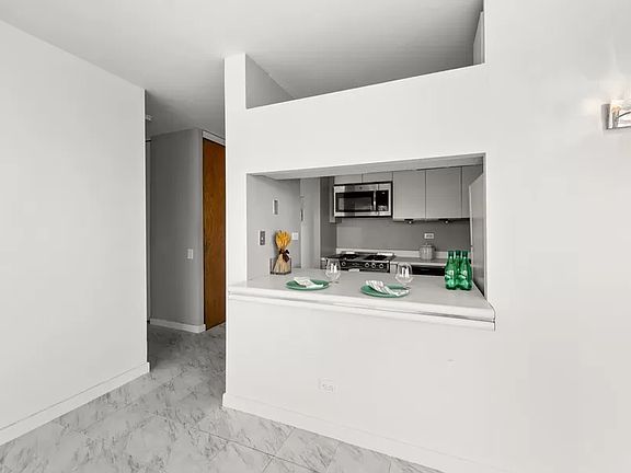 5th image of 500 W 43rd St APT 23F