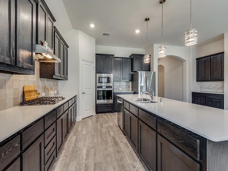 Kitchen with lots of cabinet space and refrigerator