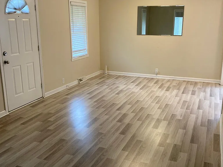Spacious living room with high end laminate flooring