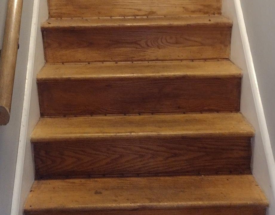 stairs going up to the apartment unit