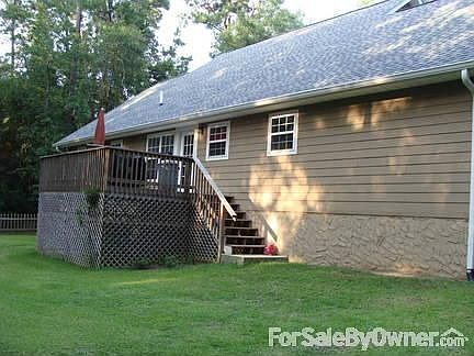Back of House
						:
						Crawl space storage and deck. Perfect for Barbques