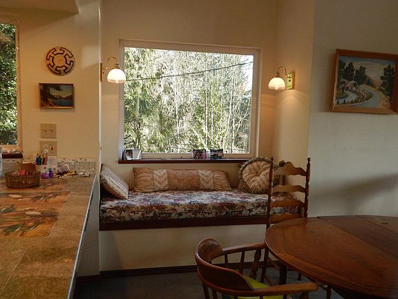 pop out window seat with storage underneath and view