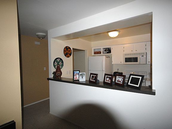 Kitchen Opens to Living Room and Dining Room