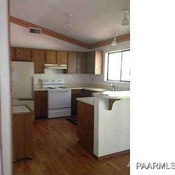 Kitchen Opens To Dining Area