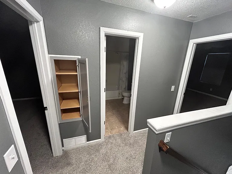 Top of the stairs (new linen cabinet)