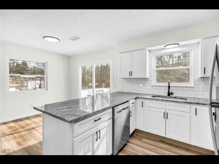 Brand new soft close cabinets with granite countertops. All appliances are brand new too