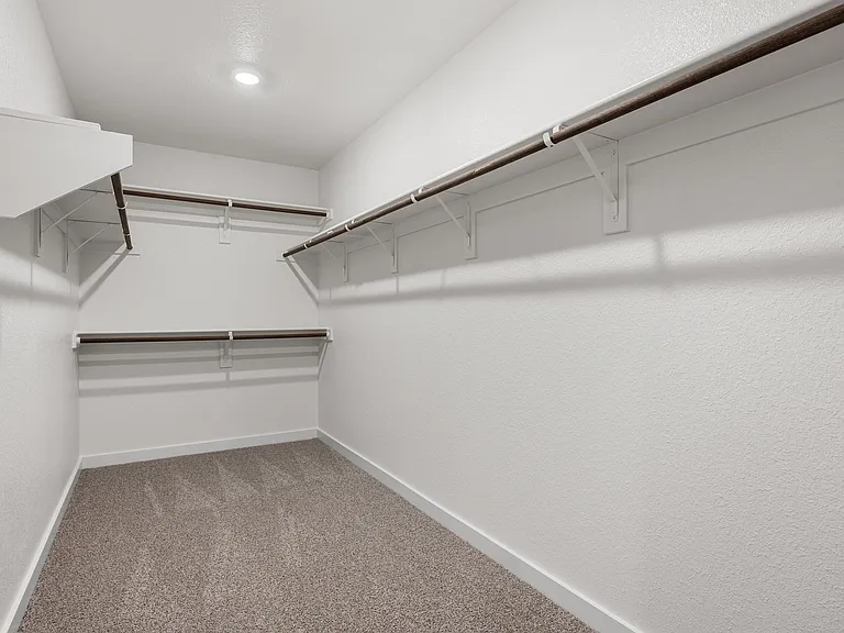 The master suite has a large walk-in closet.