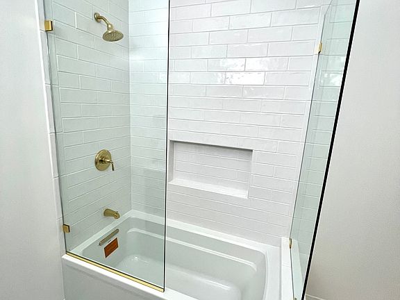 Brand New Shower and deep tub New tile floor and walls