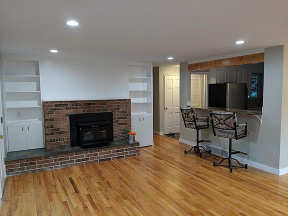 Living Room (Wood burning Fireplace with Stove insert,