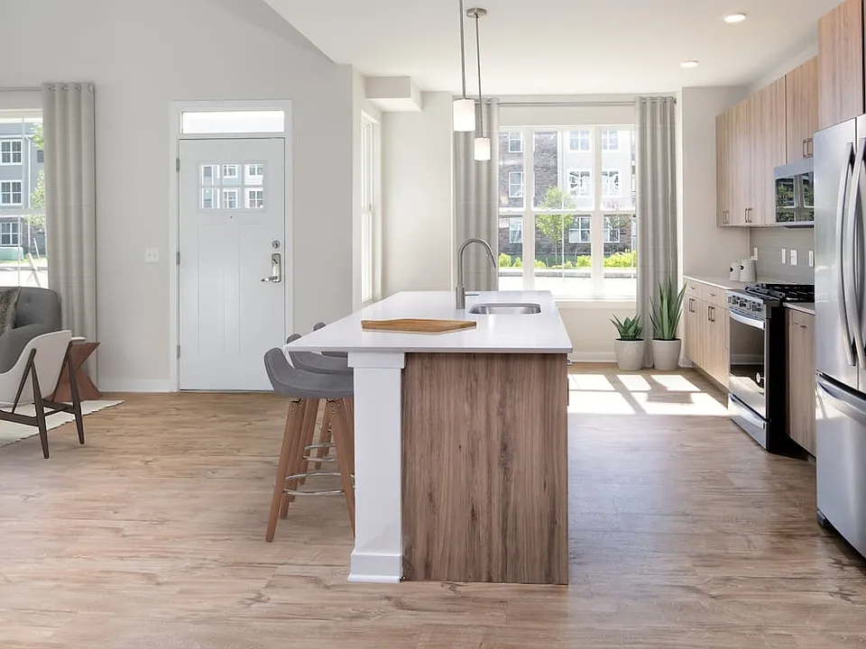 Upgrade Scheme townhome kitchen and dining areas with hard surface flooring
