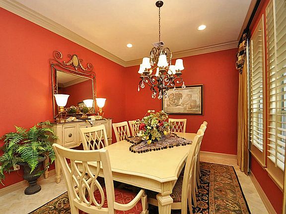 This Dining Room has lots of crown molding to accent this space.