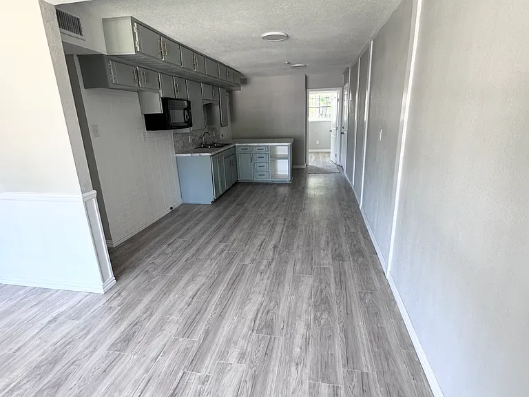View from living room to the kitchen area.