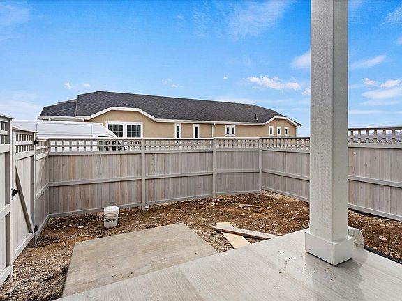 A View of the Fenced Back Yard