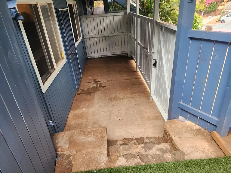 Enclosed patio for grilling and or sitting out.